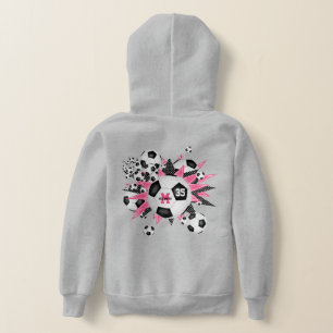 Flickor, fotboll blåser ut med rosa svarta stjärno t shirt