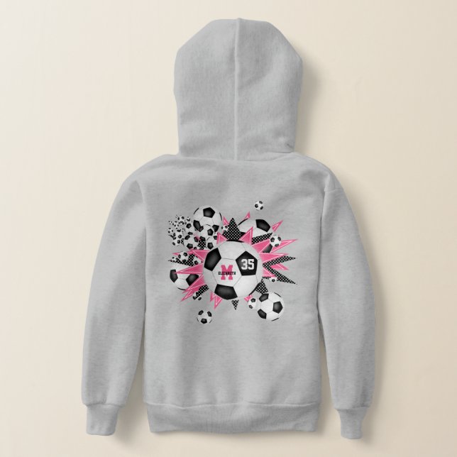 Flickor, fotboll blåser ut med rosa svarta stjärno t shirt (Laydown Baksida)