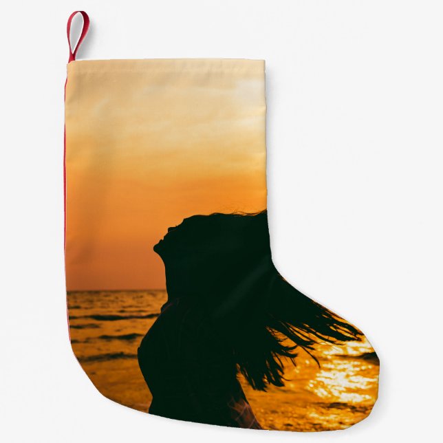 Flicksilhuett, havsolnedgång, frihet. liten julstrumpa (Framsidan)