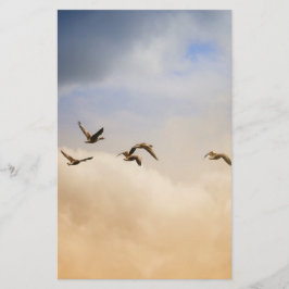 Flocket av fåglar under flygning brevpapper