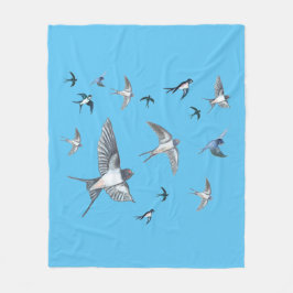 Flockor av sväljande fåglar som flyger fleecefilt