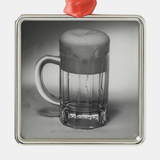 Flödande över ölexponeringsglas julgransprydnad metall (Framsidan)