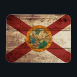 Florida Statlig flagga på Old Wood Grain Magnet<br><div class="desc">Florida Statlig flagga på Old Wood Grain känner sig fri att ändra designen enligt dina egna önskemål. Du kan ändra designplacering, orientering, bakgrundsorientering och storlek färg. Du kan också lägga till din egen text, eller slogan ange dess teckensnitt, plats och storleka, allt för att skapa den ultimata personliga presenten för...</div>