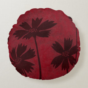 Flowerhead Silhouettes på Crimson Background Rund Kudde