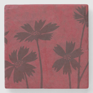 Flowerhead Silhouettes på Crimson Background Stenunderlägg