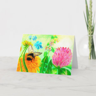 Fluffig humla på en maskrosblomma kort