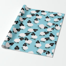 Fluffiga får på babyblått presentpapper