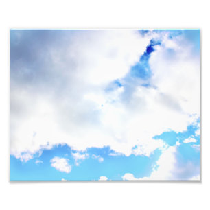 Fluffiga vita moln och blå himmel fototryck