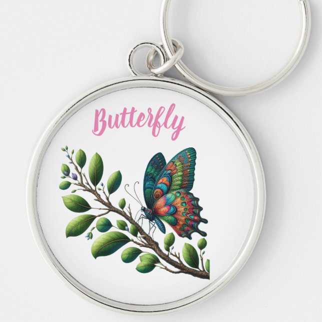 "Fluttering Oasis: Butterfly Gren Keychain" Rund Silverfärgad Nyckelring (Framsidan)