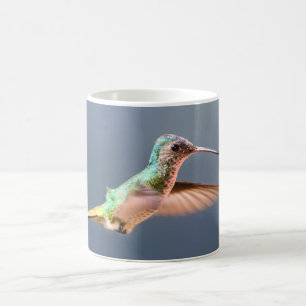 Flyg för safir för Hummingbird guld- Tailed Kaffemugg