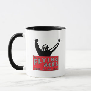 Flyga den svart logotypmuggen för ess mugg