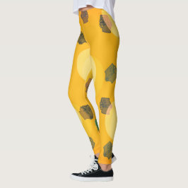 Flygande böcker i guldläppings leggings