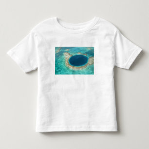 Flygbild av Blue Hole, segelbåt förankrad Tee