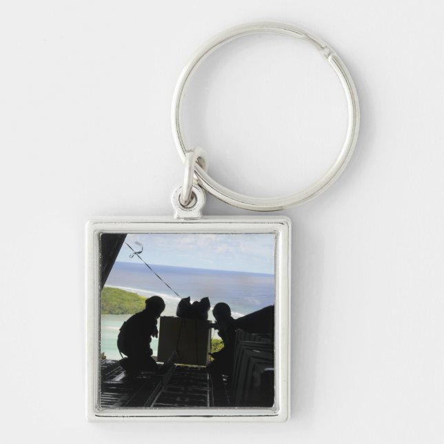 Flygplan för donerade varor fyrkantig silverfärgad nyckelring (Framsidan)