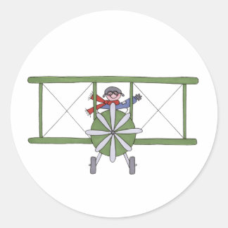 Flygplan i molnen runt klistermärke