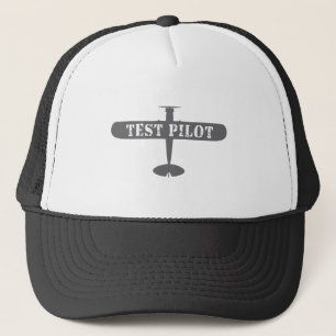 Flygplan och provpilot keps
