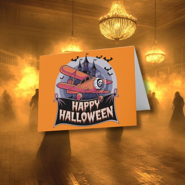 Flygplan som flyger över happy halloween banderoll kort (Skapare uppladdad)