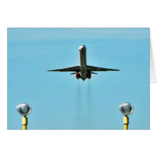 Flygplan som tar av på flygplats hälsningskort