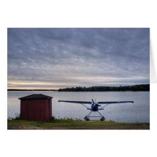 Flygplan vid solnedgång hälsningskort