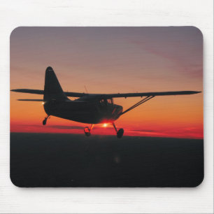 Flygplansolnedgångmusen vadderar musmatta