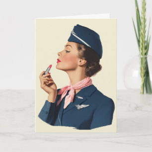 Flygvärdinna från svunna tider applicerar läppstif kort