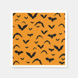 Flying bats on orange pappersservett