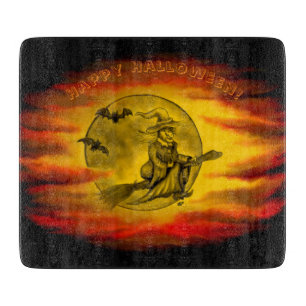 Flytande häxa med svart katt, halloween natt