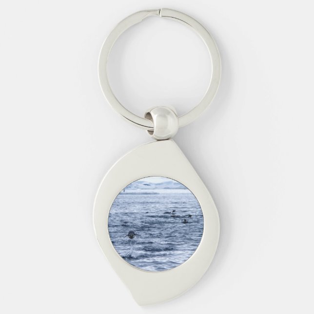 Flytande penguin swirl silverfärgad nyckelring (Framsidan)