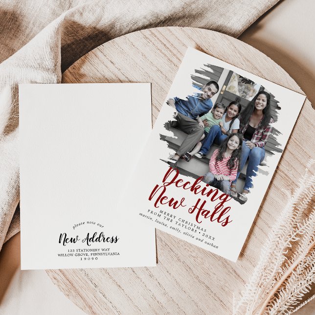 Flytta om nya högsäten i borstat rött julkort (Skapare uppladdad)