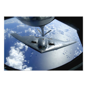 Flyttningar för en ande B-2 in i placerar för at Fototryck