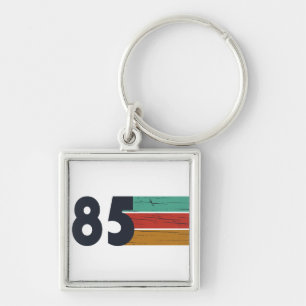 Född 1985 födelsedagspresent fyrkantig silverfärgad nyckelring