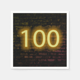 Födelsedag Neon 100 - skylt på brickmuren Pappersservett