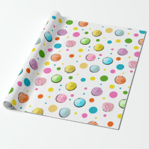 Födelsedagmuffinsen och pricker presentpapper