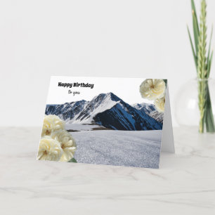Födelsedags kort med berg och vita blommor