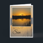 Födelsedagsson, Träd Silhouetted Behind Sunrise Kort<br><div class="desc">grattis på födelsedagen Son. Vackra orangens soluppgång bakom träd silhuette,  reflekterad på sjö med svarta rötter i förgrunden. Texten säger: grattis på födelsedagen till min son. Inuti kortet är tomt.</div>