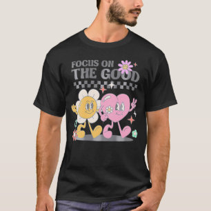 Fokusera på den Bra tillväxtens positiva citat bak T Shirt