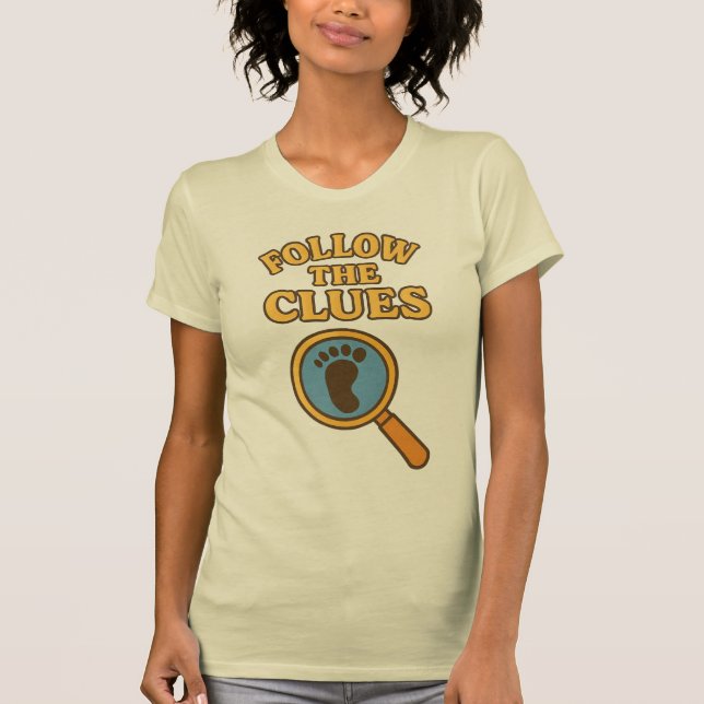 “Följ Ledtrådarna” T-Shirt (Framsida)