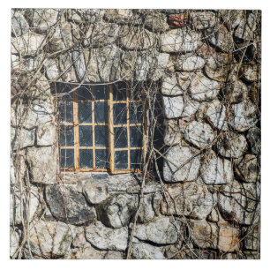 Fönster i en stenvägg kakelplatta