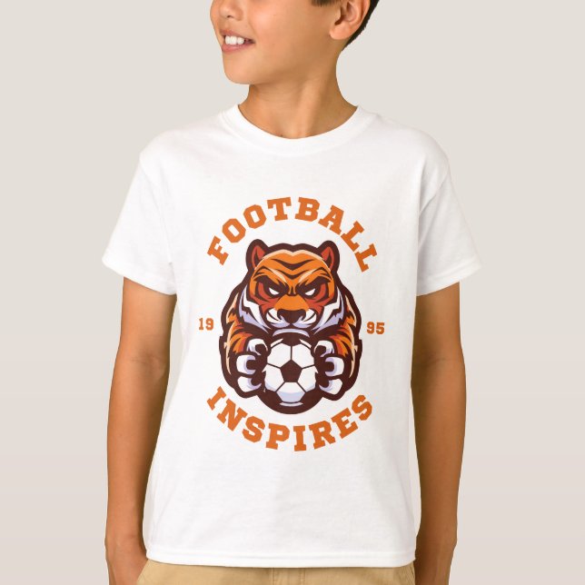 Football Inspires – Strength, Focus, Legacy T Shirt (Framsida)