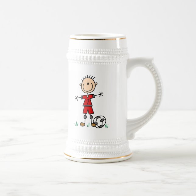 För fotbollspelare för pojke röda enhetliga sejdel (Höger)