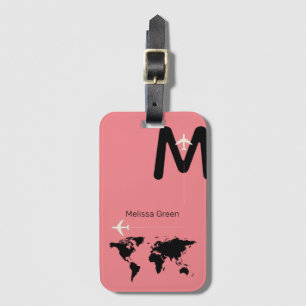 För henne, ett svart monogram på ROSA Bagagebricka