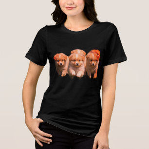 För söta valpar på en svart kortärmad t-shirt för