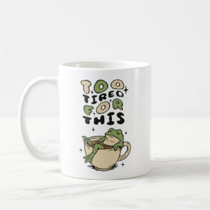 För trött för den här grodan i tekopp kaffemugg