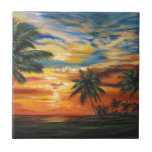 Förbluffande Tropical Sunset Kakelplatta<br><div class="desc">"Stunning Tropical Sunset II" av Carolee Vitaletti. En solnedgång mot träd och vatten på stranden.</div>