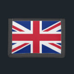 Förenade kungarikets Union Jack Flagga of British<br><div class="desc">Union Jack, ett tapearkiv med historiens trådar, fladdrar stolt, en symbol för en nation som har formats i enighet. Dess historia börjar 1606, när Skottlands Kung James VI gick över till den engelska tronen som Kung James I. För att hedra minnet av dessa två kungadömen beställde han en ny flagga...</div>