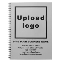 Företagets varumärke på grått anteckningsblock