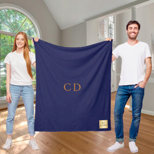Företagsmonogram för marinblå logotyp i guld fleecefilt