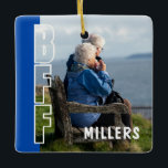 Forever & Always BFF Photo Illusion Julgransprydnad Keramik<br><div class="desc">Forever & Always BFF Photo Illusion Blue Ornament will celebrate the love story that began with friendship. This personalized ceramic ornament features your seamless photo illusion design with outlined “BFF” lettering flowing naturally through your image and a customizable blue accent block. Designed to look like one continuous photograph, the illusion...</div>