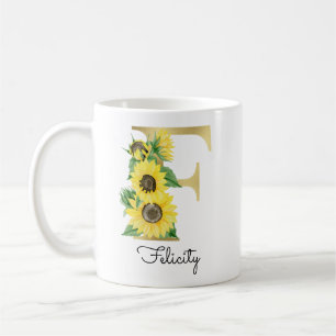 Förgylld solrosblomma med initialen F Kaffemugg
