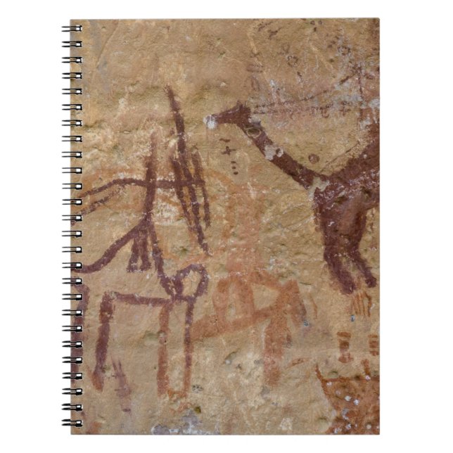 Förhistoriska klippmålningar med kameler och anteckningsbok med spiral (Framsidan)